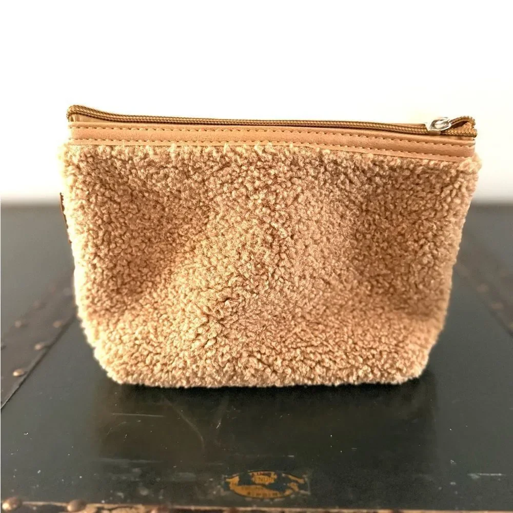 Neiman Marcus tan sherpa cosmetic bag